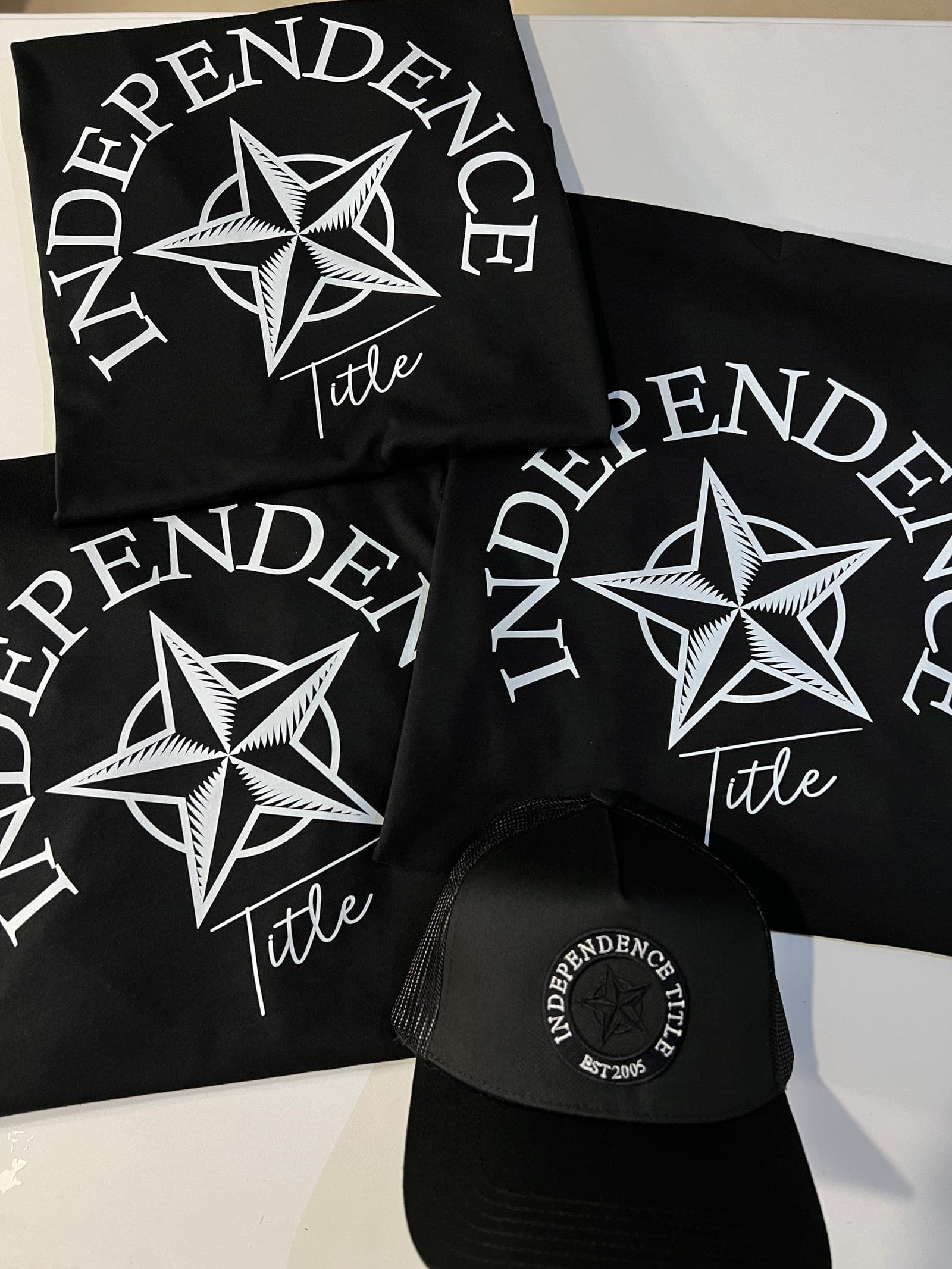 Screen printed apparel and cap for Independence Title